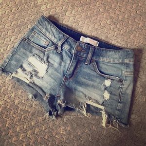 Ripped denim shorts